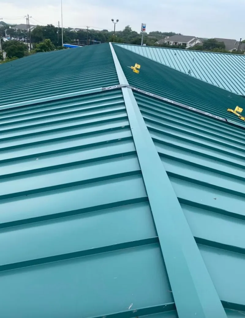 Green commercial metal roof ridge and valley for Metal Roof Repair in Fayetteville